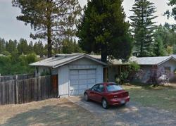 Pre-foreclosure in  SHADOWBROOK DR Cave Junction, OR 97523