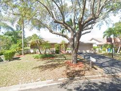 Pre-foreclosure in  NW 87TH WAY Pompano Beach, FL 33067