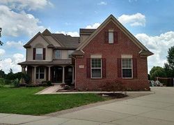 Pre-foreclosure in  WARBLER CT Commerce Township, MI 48382
