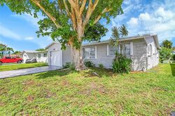 Pre-foreclosure in  NW 11TH ST Pompano Beach, FL 33063