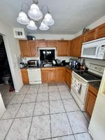 Pre-foreclosure in  FOXTAIL DR APT F West Palm Beach, FL 33415