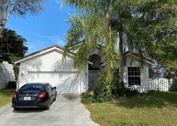 Pre-foreclosure in  SUNSET POINT DR West Palm Beach, FL 33414