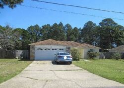 Pre-foreclosure in  WHISPERING PINES BLVD Navarre, FL 32566