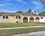 Pre-foreclosure in  LIBERTY ST Hollywood, FL 33024