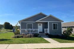 Pre-foreclosure Listing in TRADITIONS DR TRAVERSE CITY, MI 49696