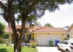 Pre-foreclosure in  NW 56TH ST Pompano Beach, FL 33067