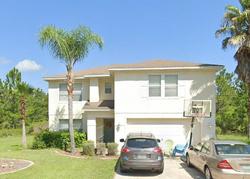 Pre-foreclosure in  LEAVER DR Palm Coast, FL 32137