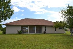 Pre-foreclosure in  NW 15TH ST Cape Coral, FL 33993