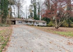 Pre-foreclosure in  CREEK HOLLOW DR Woodstock, GA 30188