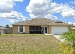 Pre-foreclosure in  NE 14TH CT Cape Coral, FL 33909