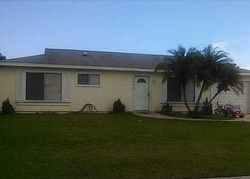 Pre-foreclosure in  SE PARKWOOD CIR Port Saint Lucie, FL 34952
