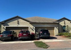 Pre-foreclosure in  SW WINDING LAKES CIR Port Saint Lucie, FL 34987