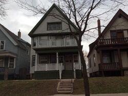 Pre-foreclosure in  W CHERRY ST Milwaukee, WI 53208