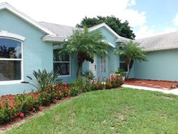 Pre-foreclosure in  SW JAFFE AVE Port Saint Lucie, FL 34953