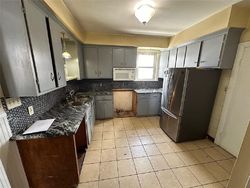 Pre-foreclosure in  WINTER ST Woonsocket, RI 02895