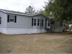 Pre-foreclosure in  NW 13TH CT Ocala, FL 34475