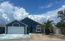 Pre-foreclosure in  SEASHELL CT Panama City Beach, FL 32413