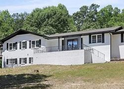 Pre-foreclosure in  THOMPSON RD Atlanta, GA 30349