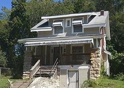 Pre-foreclosure in  OLIVE ST Kansas City, MO 64130