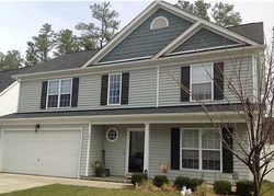 Pre-foreclosure in  BRAXCARR ST Holly Springs, NC 27540