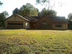 Pre-foreclosure in  THAXTON RD Atlanta, GA 30349