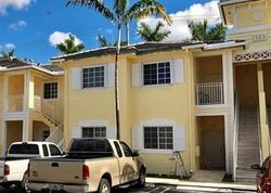 Pre-foreclosure in  NE 27TH TER UNIT 202 Homestead, FL 33033