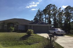 Pre-foreclosure in  3RD ST W Lehigh Acres, FL 33971