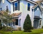 Pre-foreclosure in  EAGLE CREEK CENTER BLVD Orlando, FL 32832