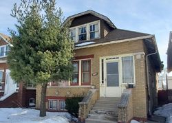 Pre-foreclosure in  W PARKER AVE Chicago, IL 60639