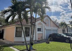 Pre-foreclosure in  E PALM RUN DR Pompano Beach, FL 33068