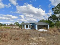 Pre-foreclosure in  GENOA AVE S Lehigh Acres, FL 33974
