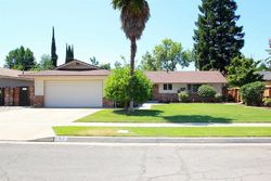 Pre-foreclosure in  W DOVEWOOD LN Fresno, CA 93704