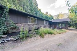 Pre-foreclosure in  CAVES HWY Cave Junction, OR 97523