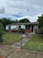 Pre-foreclosure in  W 32ND ST West Palm Beach, FL 33404