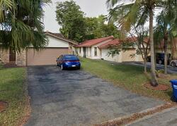 Pre-foreclosure in  NW 93RD TER Pompano Beach, FL 33071