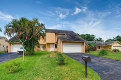Pre-foreclosure in  NW 103RD LN Pompano Beach, FL 33065