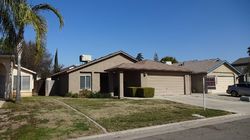 Pre-foreclosure in  W DOVEWOOD AVE Fresno, CA 93711