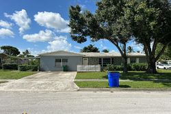 Pre-foreclosure in  NW 5TH CT Pompano Beach, FL 33063