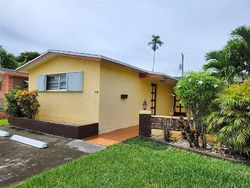 Pre-foreclosure in  NE 2ND ST Hallandale, FL 33009