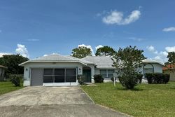 Pre-foreclosure in  FARMSWORTH DR Palm Coast, FL 32137