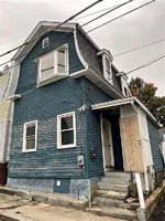 Pre-foreclosure in  WILSON AVE Woonsocket, RI 02895