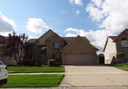 Pre-foreclosure in  WOODVIEW DR Clinton Township, MI 48038