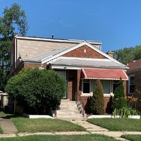 Pre-foreclosure in  S WOODLAWN AVE Chicago, IL 60628