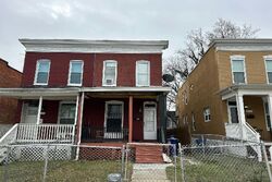 Pre-foreclosure in  DUMBARTON AVE Baltimore, MD 21218