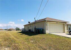 Pre-foreclosure in  NW 11TH CT Cape Coral, FL 33993