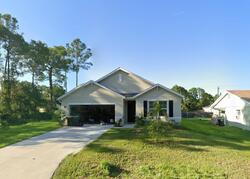 Pre-foreclosure in  ESCAROLE ST SE Palm Bay, FL 32909