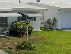 Pre-foreclosure in  NW 32ND ST Pompano Beach, FL 33064