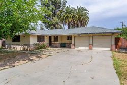 Pre-foreclosure in  N RECREATION AVE Fresno, CA 93702