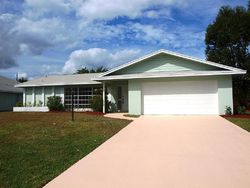 Pre-foreclosure in  SE MAPLE TER Port Saint Lucie, FL 34983