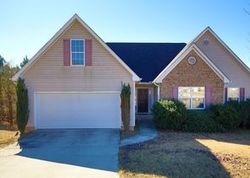 Pre-foreclosure in  MADISON FARM WAY Snellville, GA 30039